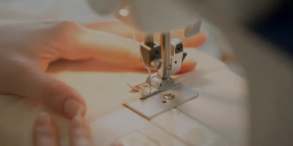 hands-sewing-machine